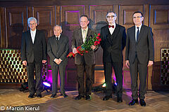 Laureat nagrody Poklewskiego w towarzystwie prezydenta Olsztyna